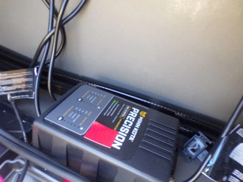 Slide: The Image of Battery charger in 2026 Xpress XP18CC boat with visible wiring. - 16