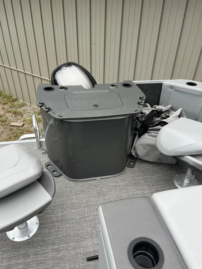 Slide: The Image of 2024 Bennington 22 SS SPS boat interior with seating and storage area. - 6