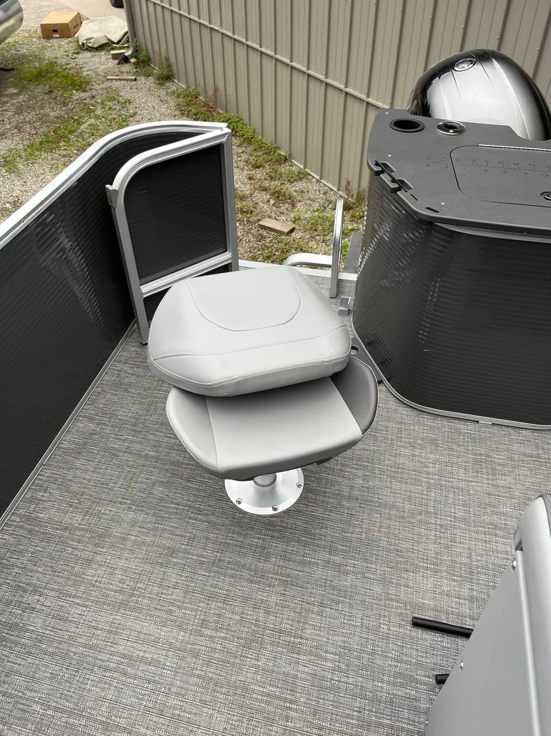 Slide: The Image of 2024 Bennington 22 SS SPS boat interior with gray seating and flooring. - 7