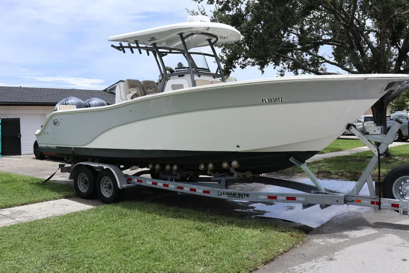 The Image of 2016 Sea Fox Commander 288 boat on trailer, parked outdoors. - 0