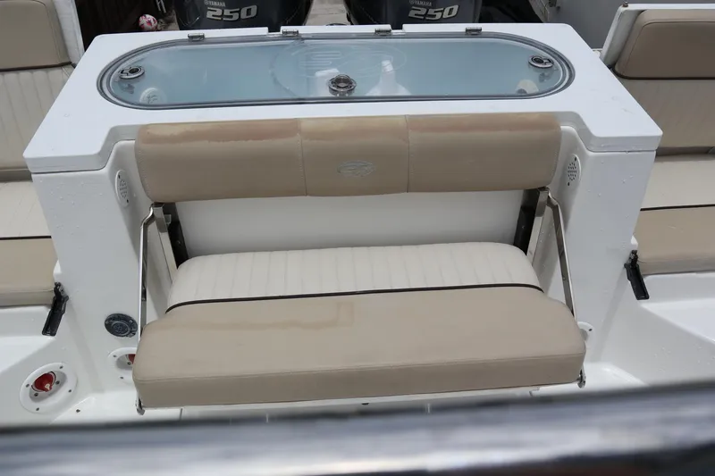 Slide: The Image of 2016 Sea Fox Commander 288 boat seating with Yamaha 250 engines in background. - 11