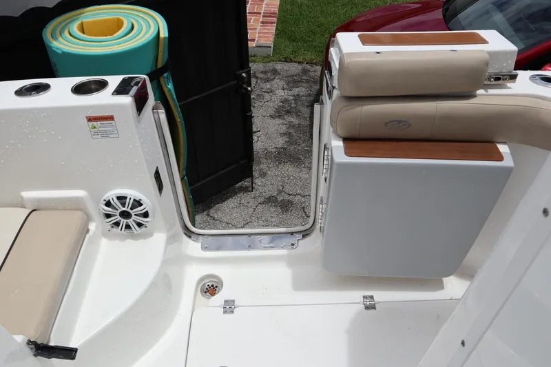 Slide: The Image of 2016 Sea Fox Commander 288 boat interior with seating and storage area. - 23