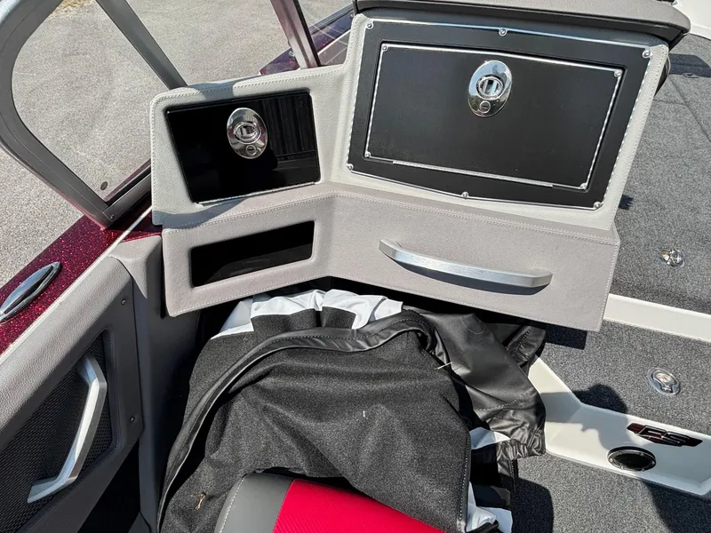 Slide: The Image of Interior of a 2021 Ranger 621cFS Pro boat with storage compartments and seating. - 10