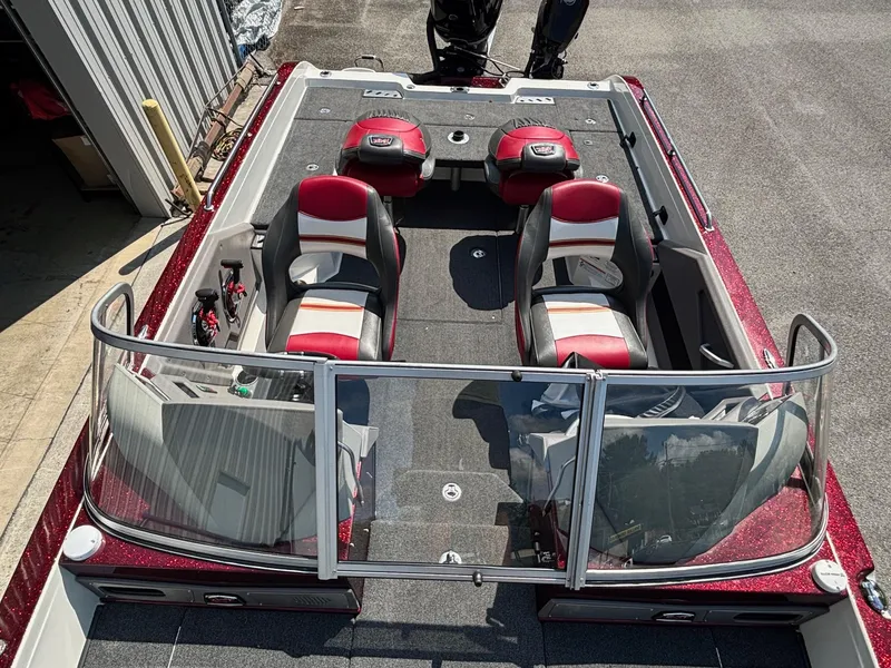 Slide: The Image of 2021 Ranger 621cFS Pro boat with red and white seating, viewed from above. - 8
