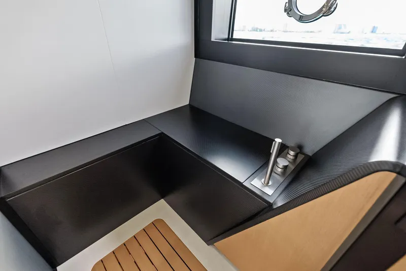 Slide: The Image of Modern interior of 2025 Wally Wallytender 100 yacht with sleek seating and window view. - 69