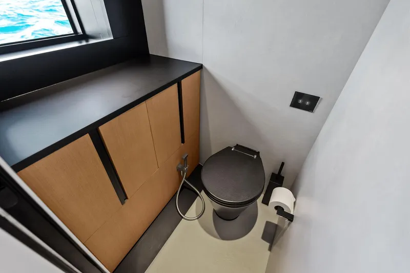 Slide: The Image of Modern bathroom in 2025 Wally Wallytender 100 yacht with sleek design and ocean view. - 70