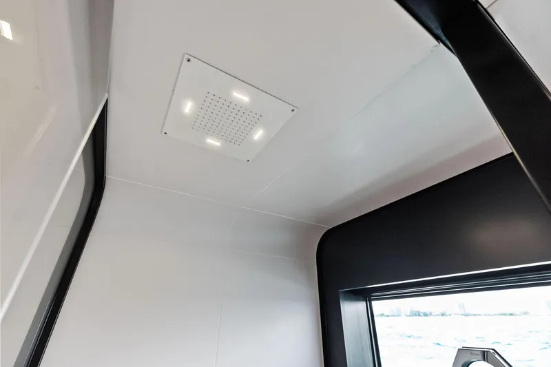 Slide: The Image of Interior view of 2025 Wally Wallytender 100 yacht, featuring modern ceiling design. - 71
