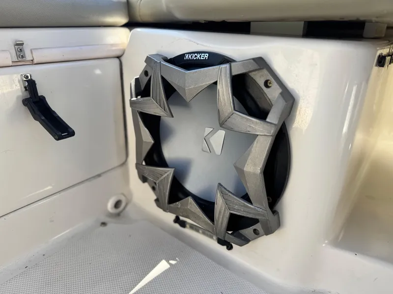 Slide: The Image of Kicker speaker installed on 2005 Sea Ray 220 Sundeck boat interior. - 20