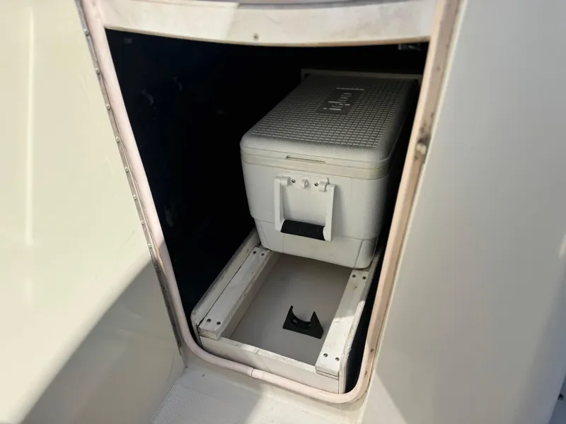 Slide: The Image of Storage compartment with cooler on 2005 Sea Ray 220 Sundeck boat. - 29