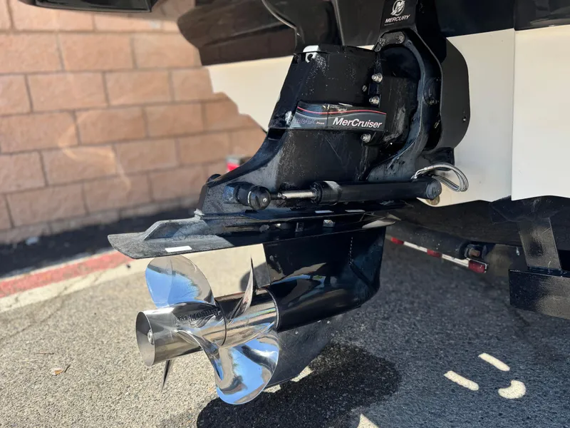 Slide: The Image of Close-up of a 2005 Sea Ray 220 Sundeck MerCruiser propeller and drive system. - 7