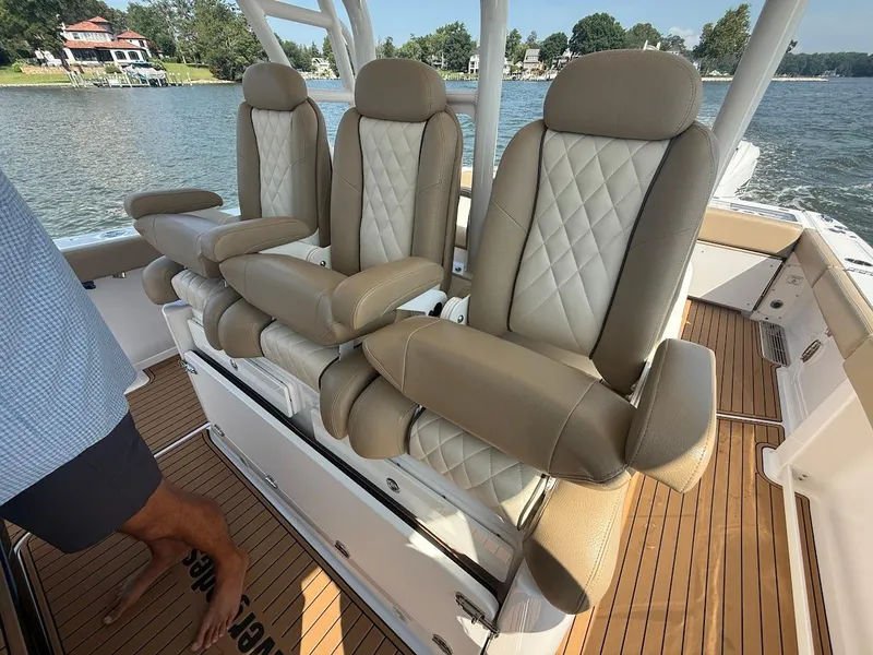 Slide: The Image of Luxurious seating on 2023 Everglades 395 Center Console boat, featuring elegant design and comfort. - 18