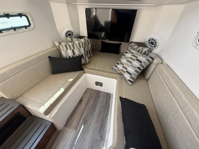 Slide: The Image of Luxurious interior of 2023 Everglades 395 Center Console with plush seating and modern decor. - 23