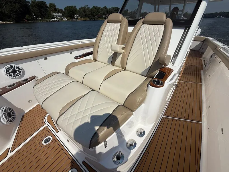 Slide: The Image of Luxurious seating on 2023 Everglades 395 Center Console boat, featuring elegant design and craftsmanship. - 27