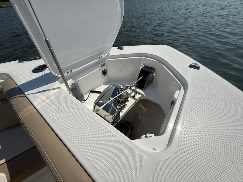 Slide: The Image of Open anchor compartment on 2023 Everglades 395 Center Console boat. - 32