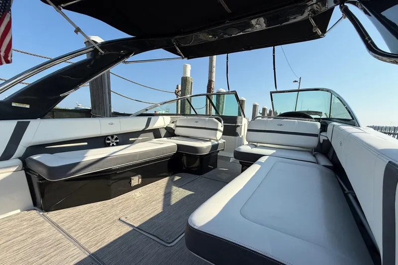 Slide: The Image of 2017 Regal 29 OBX boat interior with spacious seating and sleek design. - 6