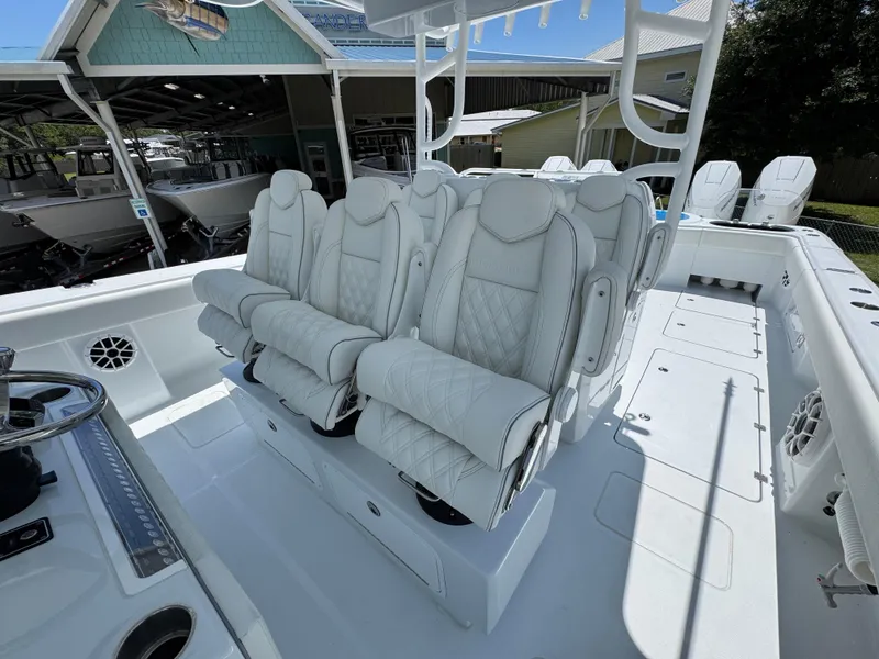 Slide: The Image of Luxurious seating on 2026 Invincible 46 Catamaran, showcasing premium white leather upholstery. - 26