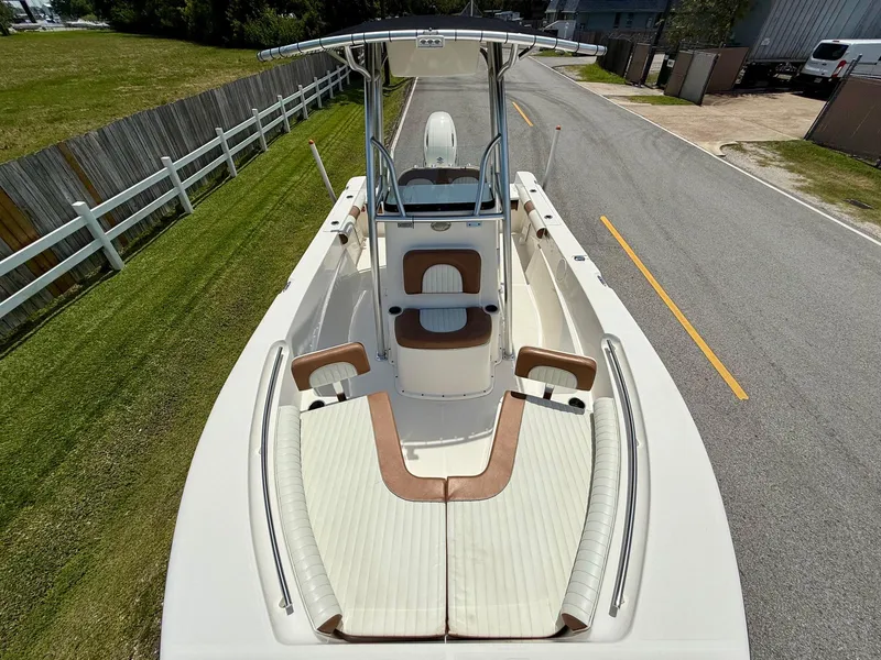 Slide: The Image of 2019 Sea Born LX21 Center Console boat with spacious seating and sleek design. - 16