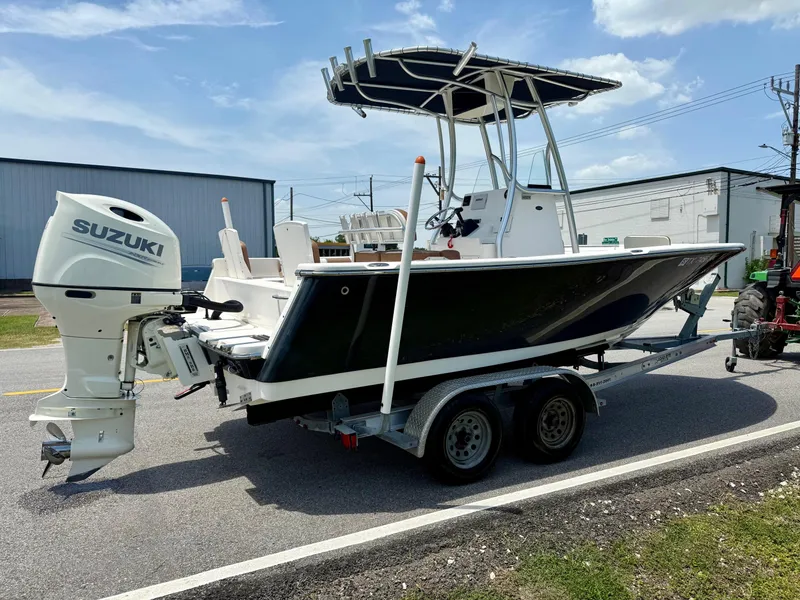 Slide: The Image of 2019 Sea Born LX21 Center Console boat on trailer with Suzuki outboard motor. - 4