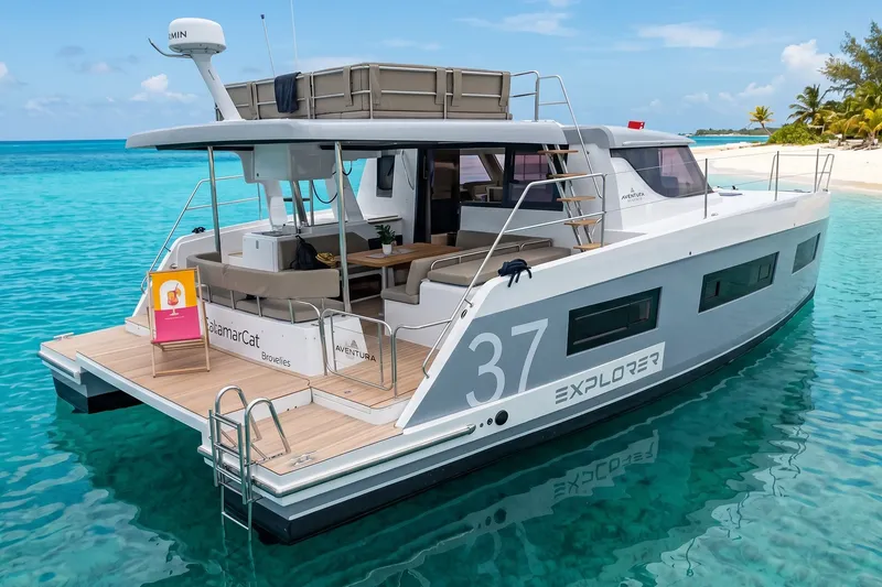 The Image of 2026 Aventura 37 Explorer Trawler on turquoise waters near a tropical beach. - 1