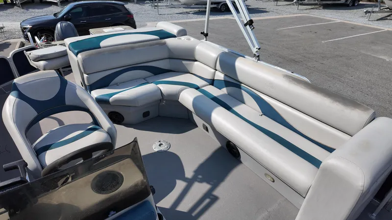 Slide: The Image of 2012 G3 SunCatcher LV 228 Fish & Cruise boat interior with cushioned seating. - 4