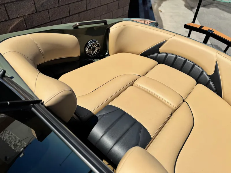 Slide: The Image of Luxurious interior of 2022 MB F21 Tomcat boat with beige and black seating. - 16