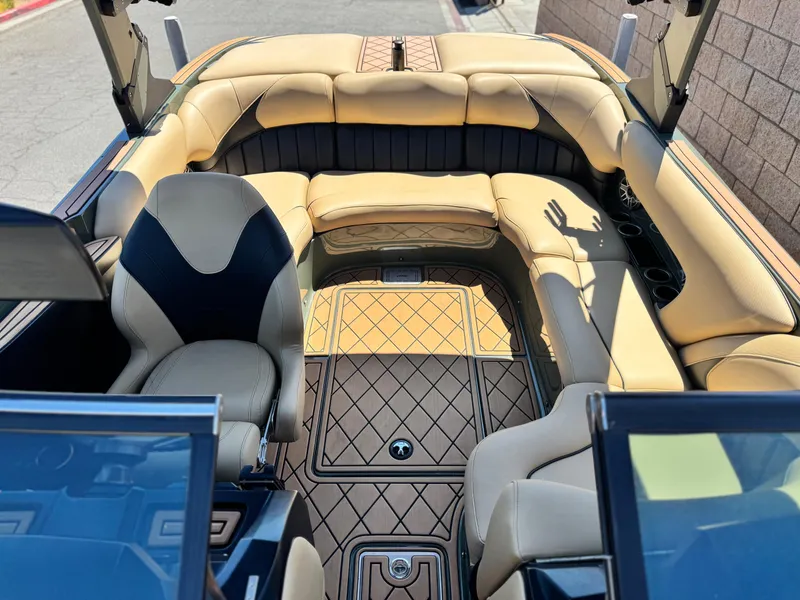 Slide: The Image of Luxurious interior of 2022 MB F21 Tomcat boat with beige seating and stylish flooring. - 18