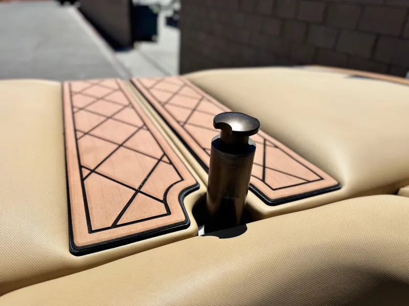 Slide: The Image of 2022 MB F21 Tomcat interior detail with beige upholstery and wooden accents. - 23