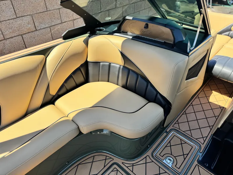 Slide: The Image of Luxurious interior of 2022 MB F21 Tomcat boat with tan and black seating. - 28