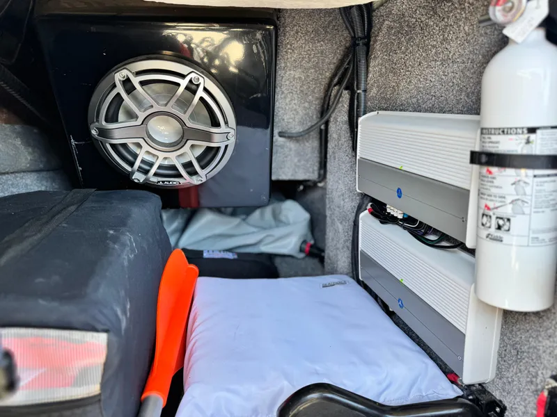 Slide: The Image of 2022 MB F21 Tomcat interior with speaker, amplifiers, and fire extinguisher. - 30