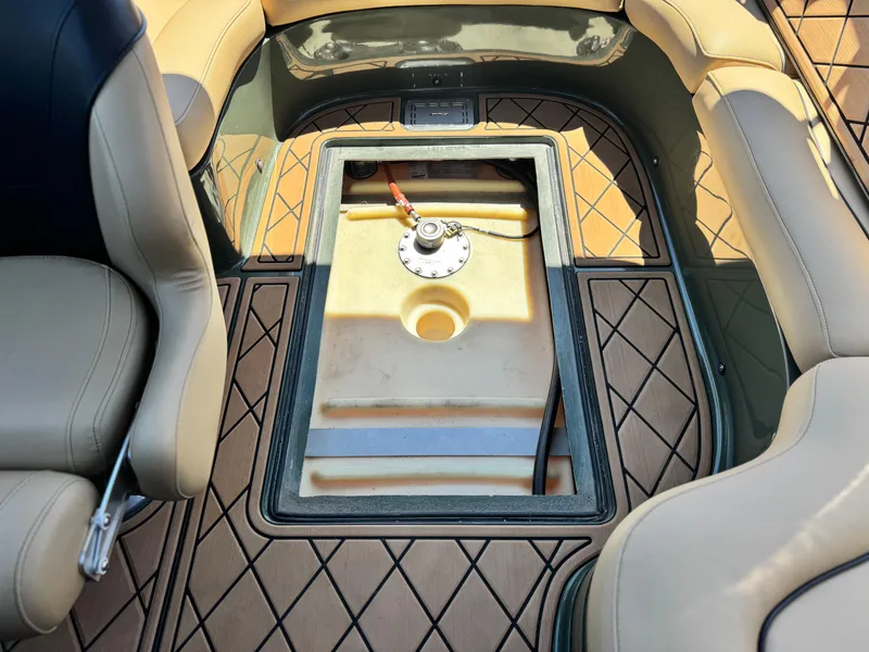 Slide: The Image of Interior view of 2022 MB F21 Tomcat boat with open storage compartment. - 31