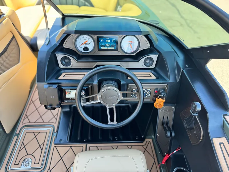 Slide: The Image of Interior dashboard of 2022 MB F21 Tomcat boat with modern controls and steering wheel. - 35
