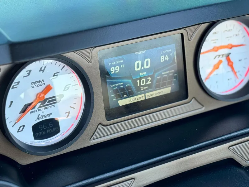 Slide: The Image of Dashboard of 2022 MB F21 Tomcat showing RPM, speed, and water depth. - 37