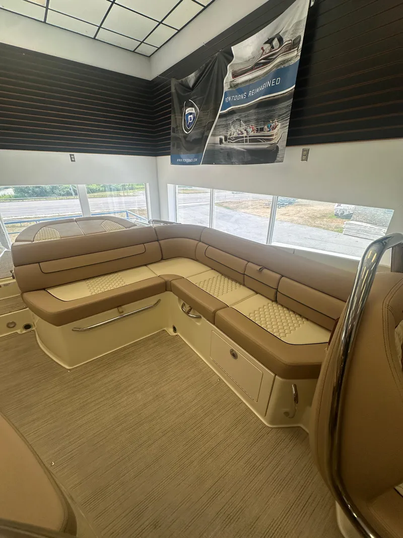 Slide: The Image of Luxurious interior of 2024 Chris-Craft Launch 25 GT with elegant seating and modern design. - 16