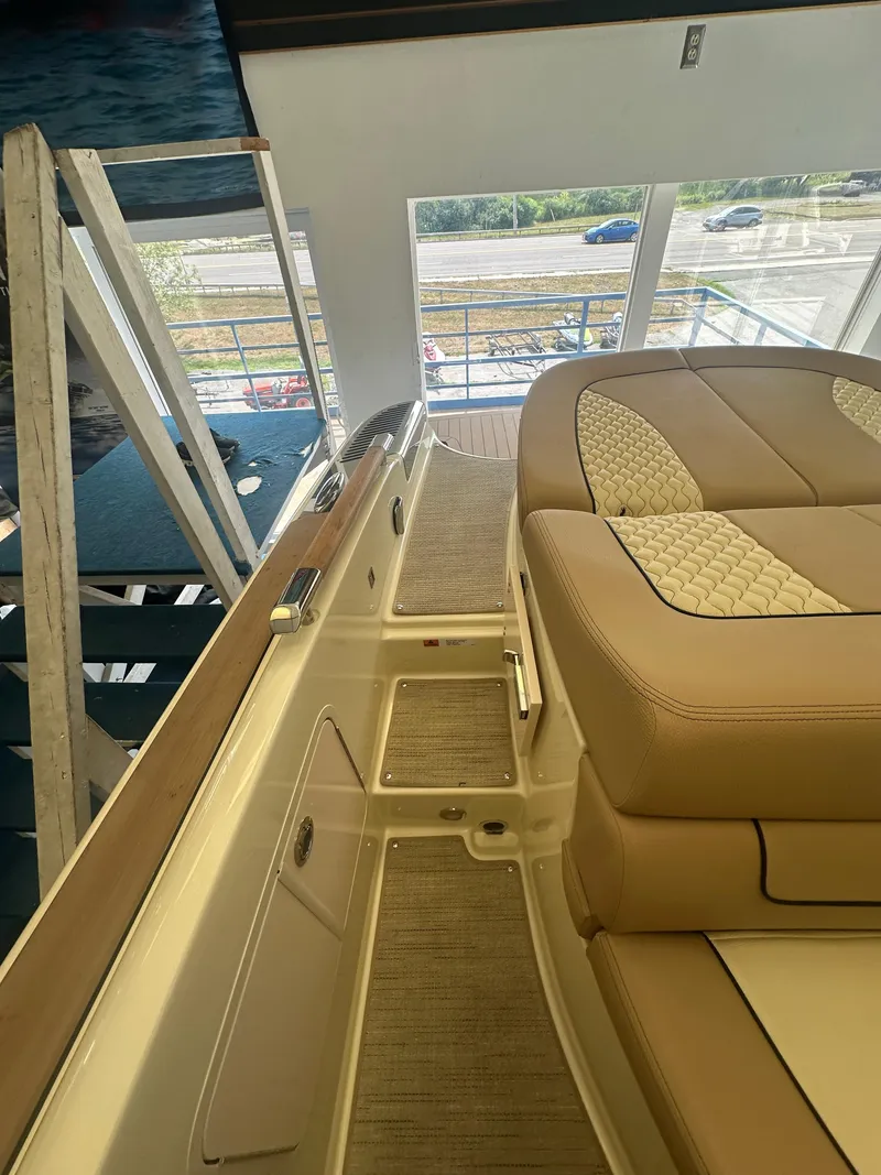 Slide: The Image of 2024 Chris-Craft Launch 25 GT interior with luxurious seating and elegant design. - 20