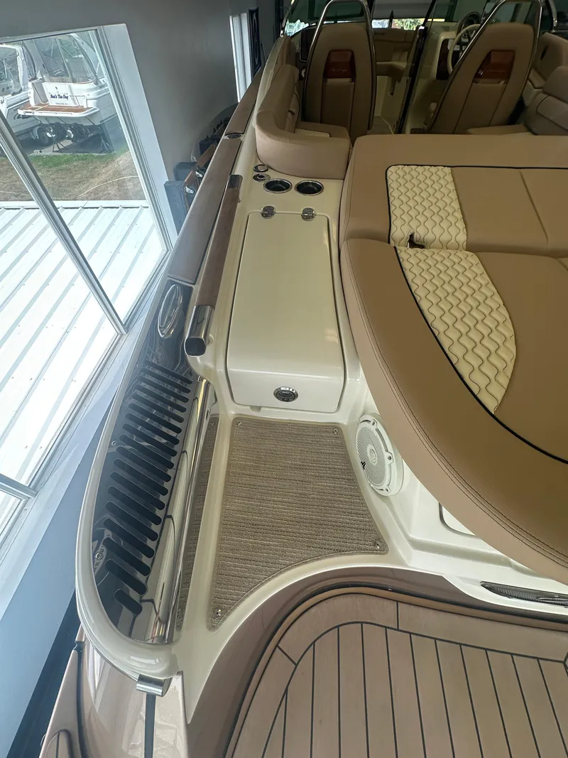 Slide: The Image of 2024 Chris-Craft Launch 25 GT interior with luxurious seating and elegant design. - 22