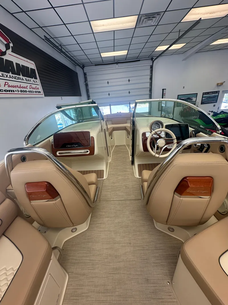 Slide: The Image of 2024 Chris-Craft Launch 25 GT interior with luxurious seating and modern dashboard. - 8