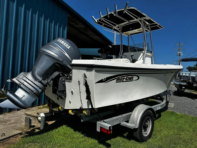 Slide: The Image of 2011 May-Craft 2000CC boat with Yamaha outboard motor on a trailer. - 3