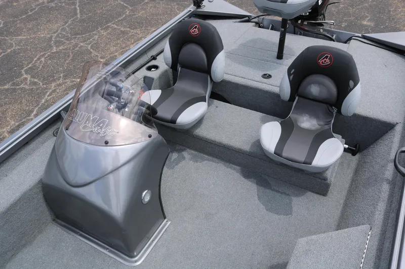 Slide: The Image of 2019 Alumacraft Prowler 175 boat interior with two seats and steering console. - 15