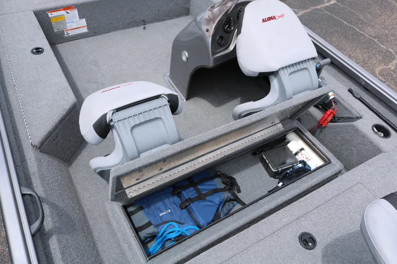 Slide: The Image of 2019 Alumacraft Prowler 175 boat interior with storage compartment and seating. - 17
