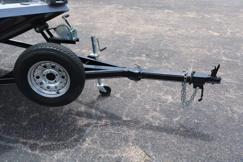 Slide: The Image of Trailer hitch of 2019 Alumacraft Prowler 175 on asphalt surface. - 2