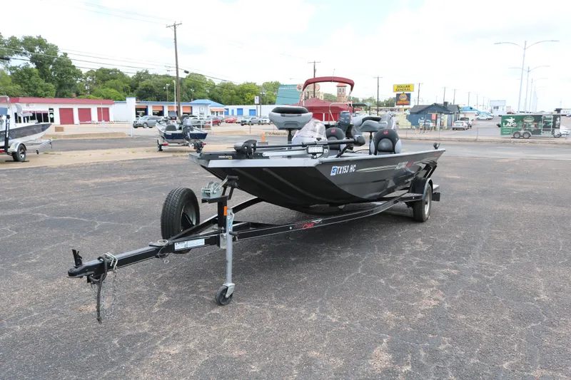 Slide: The Image of 2019 Alumacraft Prowler 175 boat on trailer in parking lot. - 3