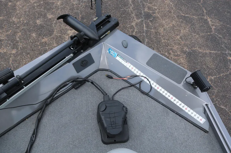 Slide: The Image of 2019 Alumacraft Prowler 175 boat deck with measuring ruler and equipment. - 9