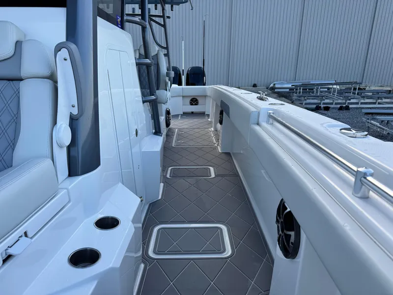 Slide: The Image of 2022 Invincible 40 Catamaran interior with sleek seating and modern design features. - 15