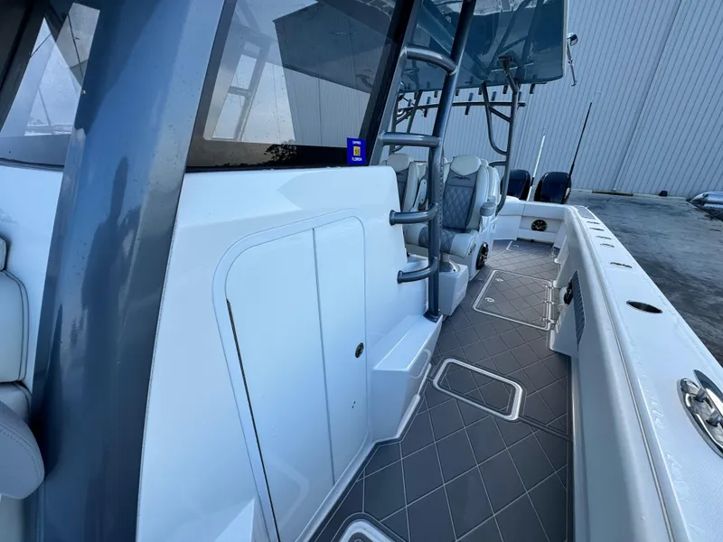 Slide: The Image of 2022 Invincible 40 Catamaran interior with sleek design and modern seating. - 16