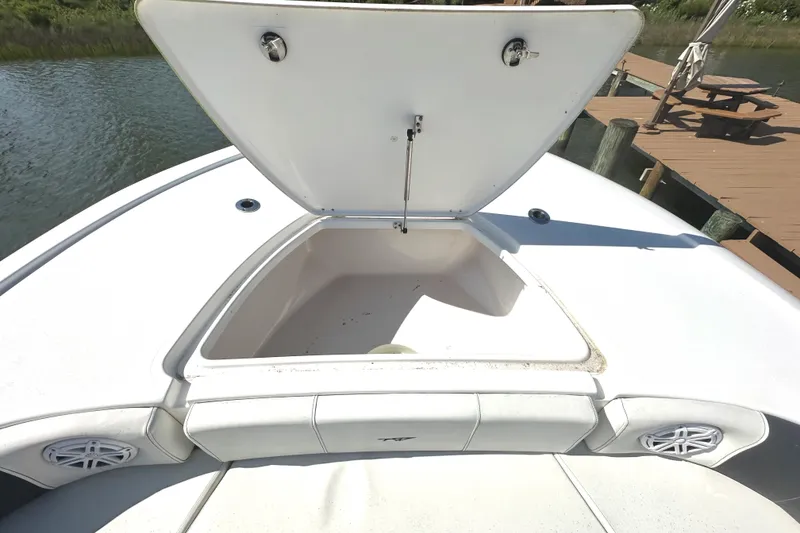 Slide: The Image of Open storage compartment on 2021 Tidewater 2700 Carolina Bay boat. - 20
