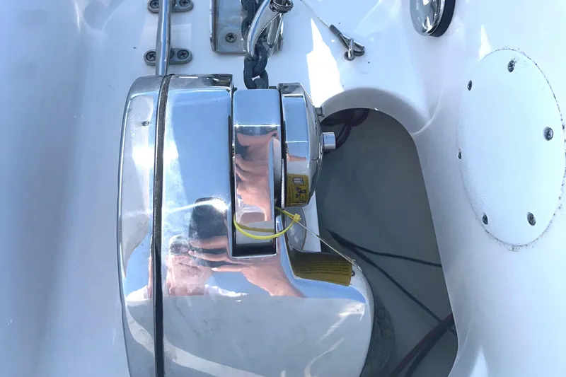 Slide: The Image of Close-up of a 2021 Tidewater 2700 Carolina Bay boat's anchor winch system. - 21