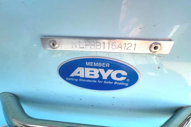 Slide: The Image of 2021 Tidewater 2700 Carolina Bay with ABYC member sticker and serial number plate. - 22