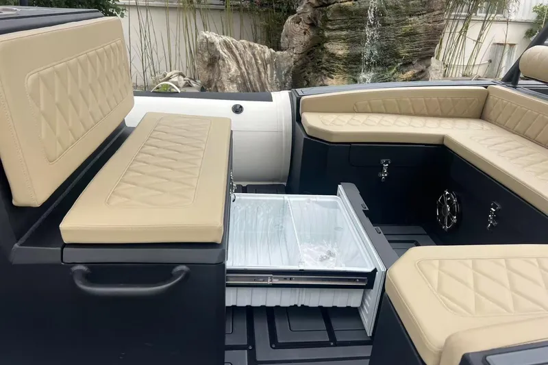 Slide: The Image of Luxurious seating and storage on 2025 RIB-IT Ultra Light 26 boat interior. - 7
