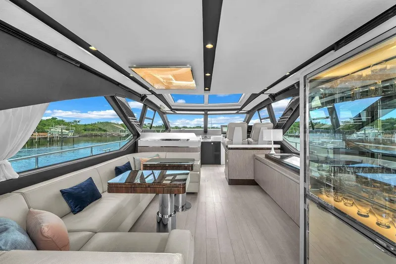 Slide: The Image of Luxurious interior of 2020 Azimut S7 FLY yacht with panoramic windows and elegant seating. - 42