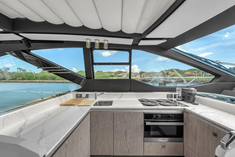 Slide: The Image of Luxurious kitchen interior of 2020 Azimut S7 FLY yacht with modern appliances and scenic view. - 51